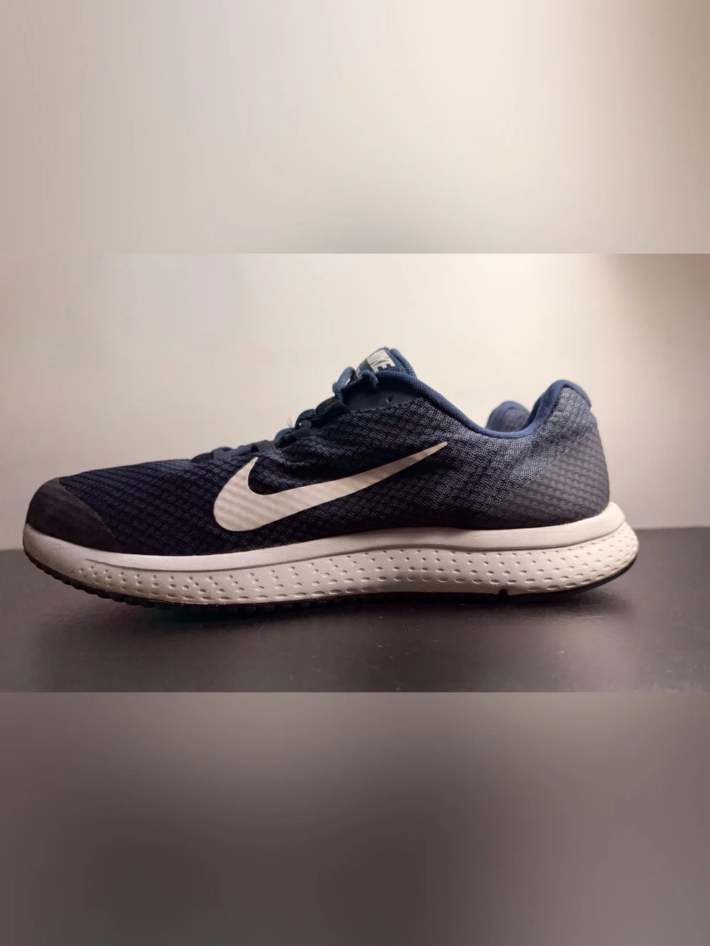 Nike runallday size
